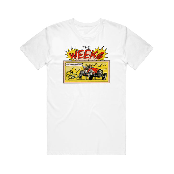 Image of a white tshirt against a white background. The center of the tshirt has a cartoon/comic design to it. It says the weeks in red and black, the word weeks has a yellow pointy design around it. Below that is a horizontal rectangle that is yellow- inside of it is a red old school race car with a person driving it. In the upper left corner of the rectangle, a white box with black text says 
